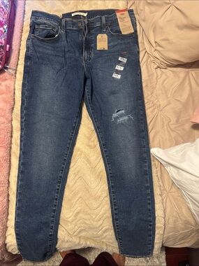 Women’s Dark Blue Distressed Skinny Jeans